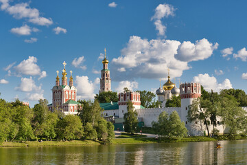 Fototapeta na wymiar Novodevichy convent in Moscow, Russia at summer day. Historical architecture of Moscow. UNESCO world heritage site.
