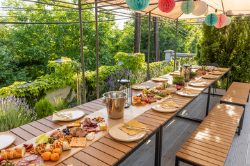 Food served outdoor on a long table