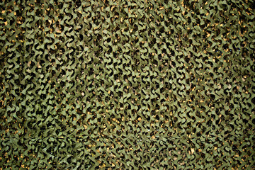 Camouflage textile cover pattern net used for military or hunting.