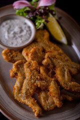 Fried frog legs in batter
