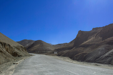 Road in the mountains with blue sky.