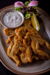 Fried frog legs in batter