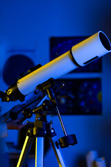 New modern astronomic white telescope pointing at night sky, Milky way, stars and Moon at...