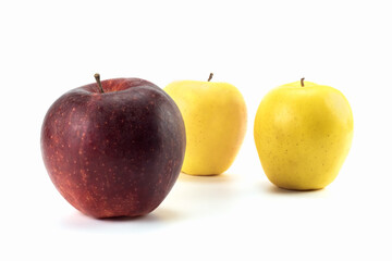 Several fresh apples isolated on a bright background. Close up view.