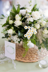 Flower composition with green white flowers