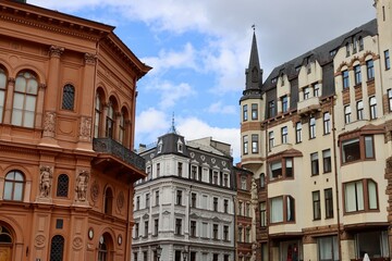 Obraz premium Street view of Old town Riga, Latvia. Jugendstil decorated residential buildings on sunny summer day