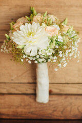 bouquet of white flowers. Bridal bouquet with summer flowers in white