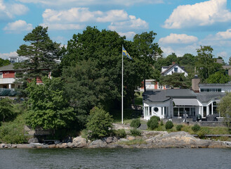 
Summertime view of houses on islands in the archipelago outside of Stockholm, the capital of Sweden, one of the Nordic countries along the Baltic Sea in Scandinavia, Europe.  - 516543162