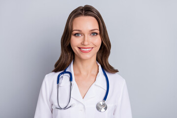 Portrait of qualified virologist lady smiling hear patient internet symptoms diagnostics isolated grey color background