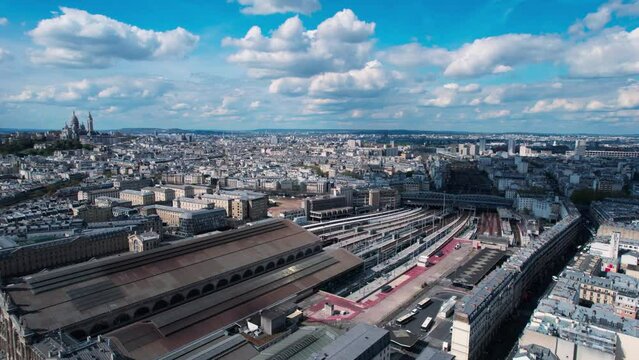 Panoramic aerial view of Paris train station Gare du Nord and whole city.