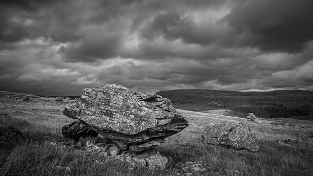 A stormy day at the Norber Erratics, one of the finest groups of glacial erratic boulders in the UK, close to the village of Austwick, in the Yorkshire Dales, England.