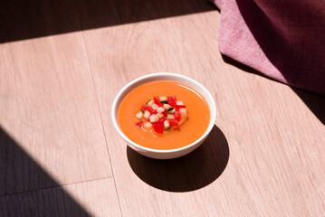 traditional flavor gazpacho bowl from spain, made from vegetables such as cucumber, tomato, vinegar, salt, onion, garlic.
