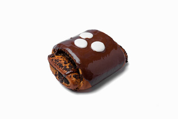 Bun with grated poppy seeds, chocolate and white icing
