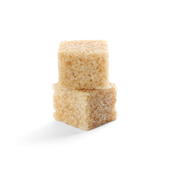 Two brown sugar cubes isolated on white