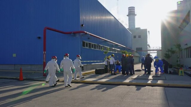People at the end of a chemical emergency drill