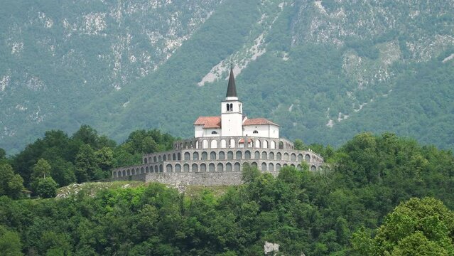 Drone view of St Anton Church and Kobarid Ossuary in Slovenia. Caporetto Memorial from First World War