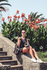 Obraz premium sport fit outdoor sea.girl goes sports,fitness,yoga seashore.Meditation, relaxation, mental health.Active lifestyle, self-care, health.Wellness.Fit nature.myofascial release workouts tracking fitness