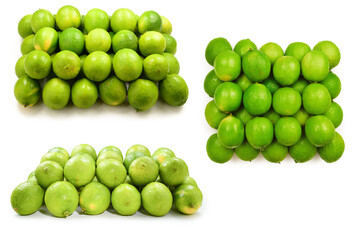 Many fresh limes on white background.