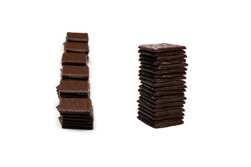 Dark chocolate candies isolated on white background.