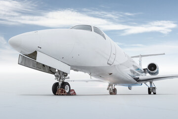 Close-up of a modern private jet isolated on bright background with sky