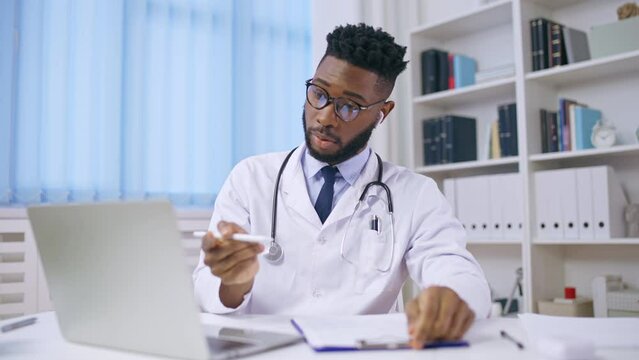 African American Doctor Counselling Patient Via Video Call, Telemedicine Sector