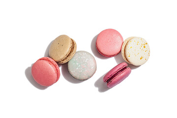 Different colorful French macarons isolated on white background. Culinary and cooking concept