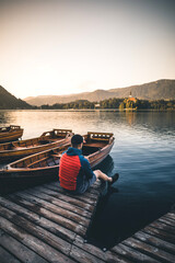 Man at Lake Bled in the Morning