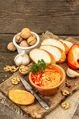 Traditional Middle Eastern dip Muhammara. Roasted red bell pepper with walnuts and spices