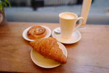 croissant and cup of coffee
