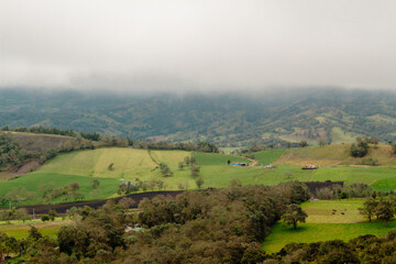 Fototapeta na wymiar Beautiful Colombian landscape in Guatavita on a misty day, Cundinamarca, Colombia.