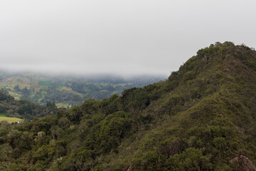 Fototapeta na wymiar Beautiful Colombian landscape in Guatavita on a misty day, Cundinamarca, Colombia.