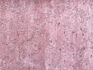 Old peeling paint. Cracked paint. Metal surface. Rust structure.