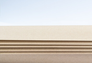 Minimalist brown paper curved on white background