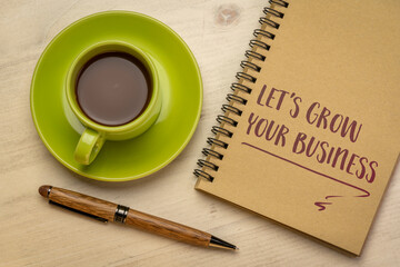 let's grow your business, handwriting in a notebook with cup of coffee, offer, help or service concept