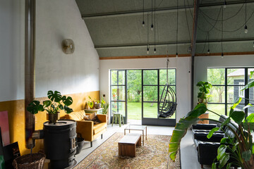 Trendy Boho eclectic interior with vintage furniture. High quality photo