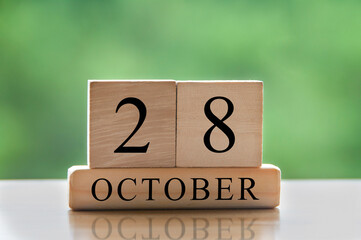 October 28 calendar date text on wooden blocks with copy space for ideas or text. Copy space and calendar concept