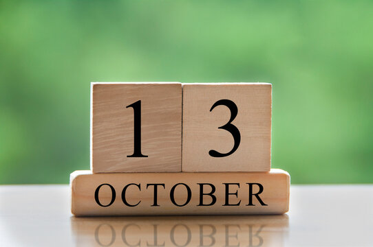 October 13 calendar date text on wooden blocks with copy space for ideas. Copy space and calendar concept
