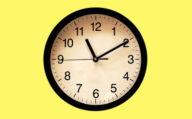 Classic black and white analog clock red background at Eleven o'clock ten minutes