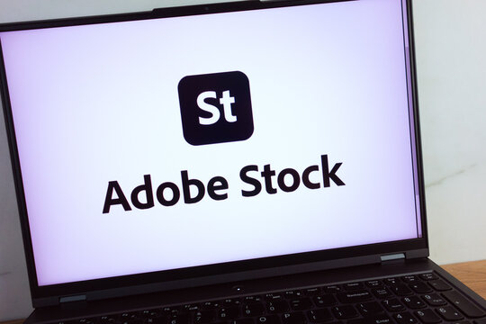 KONSKIE, POLAND - July 11, 2022: Adobe Stock stock photography service logo displayed on laptop computer