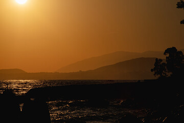 photography landscape mountains and sea at sunset