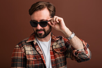 Fototapeta premium handsome man on brown background
