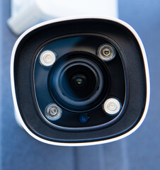 CCTV surveillance camera in factory area to control security system area with torch light and copy space