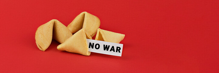 Chinese fortune cookies on red background with inscription NO WAR. Call for peace and an end to the...