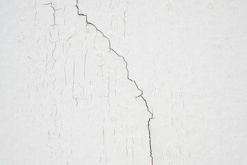 cracked concrete on white wall texture background