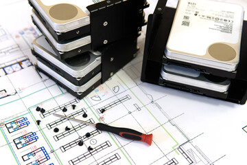 Hard drive and ssd with a screwdriver upgrade and repair the internal parts of a desktop computer,...