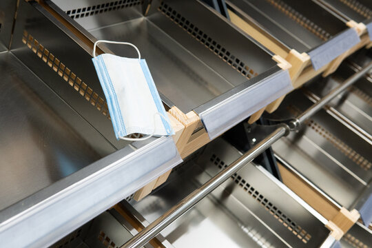 Empty Shelves In A Supermarket Due To Stockpiling During A Pandemic