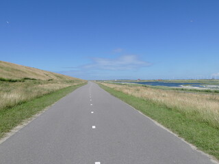 Road behind the dike near Petten, North Holland, Holland, Netherlands