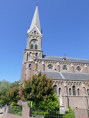 Fototapeta na wymiar The Neo-Romanesque Catholic Ursula Church in Warmenhuizen, North Holland, The Netherlands