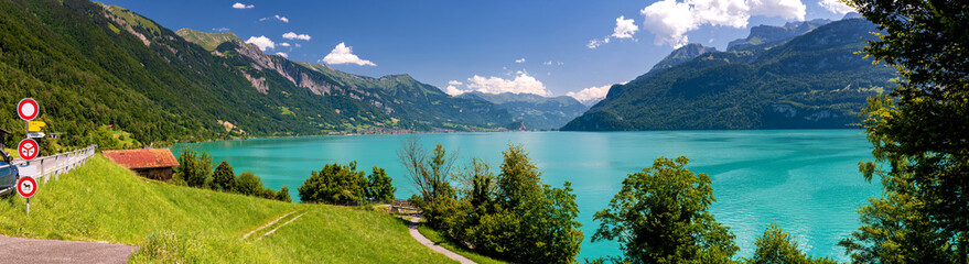 Fototapeta na wymiar Lake Brienz (Brienzersee) in the swiss Alps in the canton of Berne in Switzerland on a sunny day