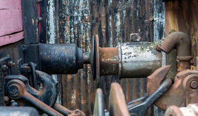 Old rusty iron coupling between two train carriages. Wagon buffers.